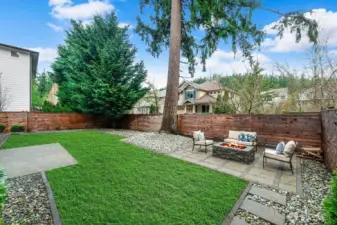 New landscaping with separate back patio.  Private, fully fenced back yard with custom fencing. Please note: Lawn is photo shopped. Front and back lawn have been re-seeded and fertililzed.