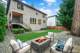Separate back patio with beautiful firepit and seating area. Please note: Lawn is photo shopped. Front and back lawn have been re-seeded and fertilized.