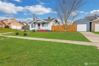 Front of home & detached garage. Lawn is photoshopped