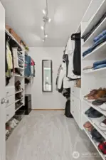 Spacious walk-in closet for primary bedroom.