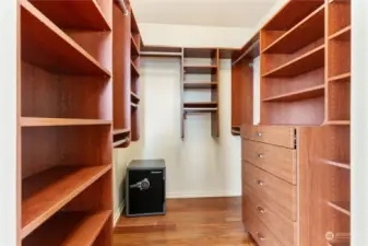 His & her Walk-in Closets with custom built in's!