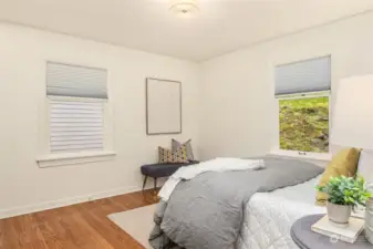 Primary bedroom with spacious built out closet.