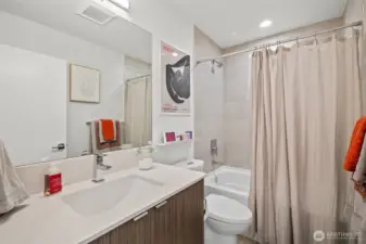 Large full guest bath.