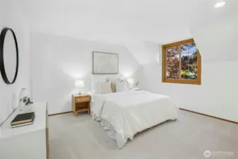 Bedroom #3 on the upper level is oversized! This space could also be a bonus room or a wonderful guest suite.