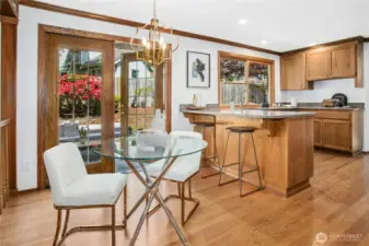 French doors open to a professionally landscaped, level lawn & dual patios. The backyard is fully fenced. Automatic sprinklers ensure effortless landscape care.