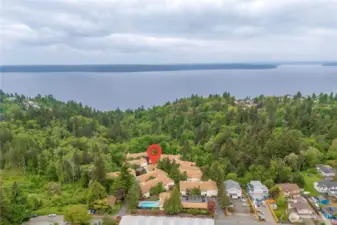 This home is nestled in a quiet, tree-lined enclave that feels worlds away, yet is just minutes to shopping, dining, parks, freeways, Downtown Seattle, and Sea-Tac Airport.
