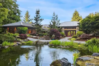 Inspired by Frank Lloyd Wright Falling Water and Taliesin this custom home is the perfect blend of PNW and Japenese zen garden
