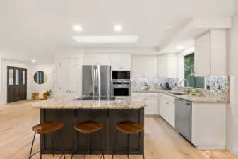 Slab Granite, New SS Appliances, Breakfast Island, Undermount Lighting, & Abundant Cabinetry!
