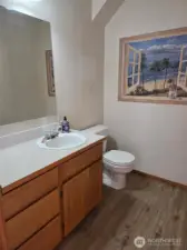 Powder bath with custom wall painting & NEW Floors!