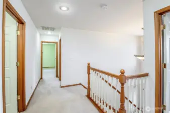 Upstairs landing looking toward primary suite