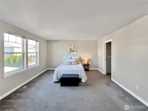 Primary bedroom with queen sized bed