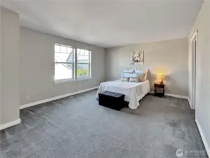 Primary bedroom with queen sized bed