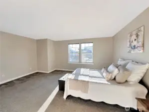 Primary bedroom with queen sized bed