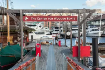 A short stroll brings you to The Center for Wooden Boats, where maritime heritage comes alive through hands-on exhibits, boat rentals, and one of Seattle’s most scenic waterfront parks.