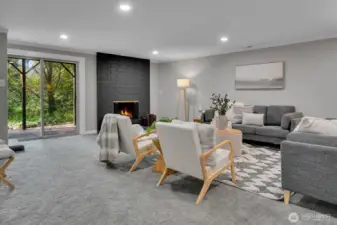 Daylight Basement Huge Rec/Great Room W/Fireplace & Lg sliders to Patio/Creek