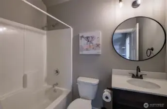 Full bath upstairs between the two bedrooms