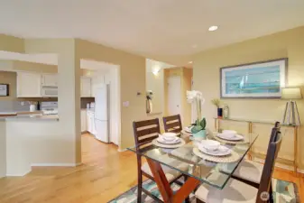 Dining room is open to the light-filled kitchen.