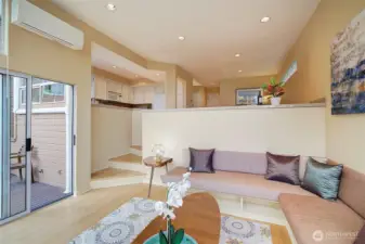 Sliders off living room to view deck.