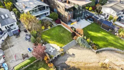 50 ft private shoreline, flat lawn and sandy beach invite you to relax and unwind in total tranquility