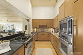 Large skylight and vaulted ceilings open to incredible lake views