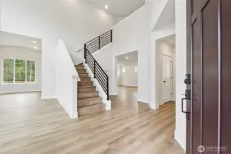 LVP flooring on main level, stair, and upper hallway. Stunning!Pic of similar home, colors and materials may vary