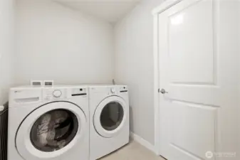 Upper-level laundry room for everyday ease.