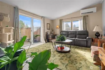 The family room with sliding door to the deck.