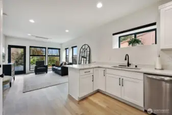 Lower level living room and kitchen.
