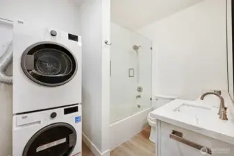Separate washer/dryer installed in lower level.