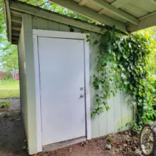 Little shed on the side of the house