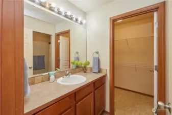 Walkthrough bath to huge walk-in closet.