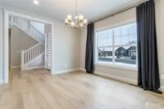 Spacious living room could easily serve as a formal dining room as well.