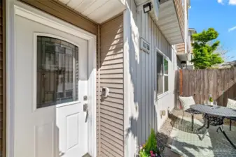 Front door off fully fenced patio