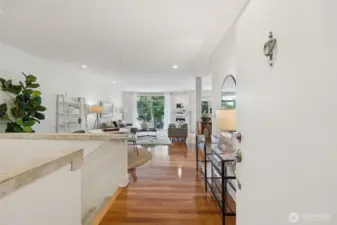 Main entry views to the open floorplan on  main and stairs down to the lower level
