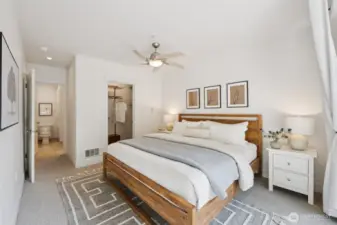 Primary bedroom with walk-in closet and full bathroom