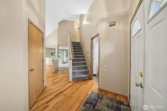 Entry to the gorgeous refinished hardwood floors.