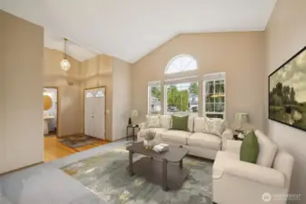 Family room off the entryway (virtually staged)