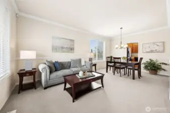 Warm and inviting, the formal living and dining rooms welcome you as you step into this stunning home.