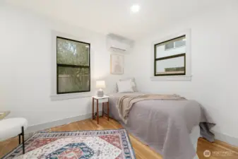 Main floor 2nd bedroom situated with mini-split heating and cooling.