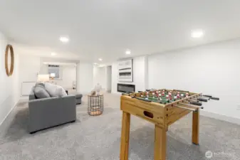 Flex space with non-conforming ceiling heights, ideal for media, play and hobbies.