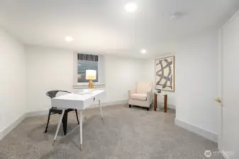 Lower level office with non-conforming ceiling heights perfect for work from hoe option with egress and full closet.