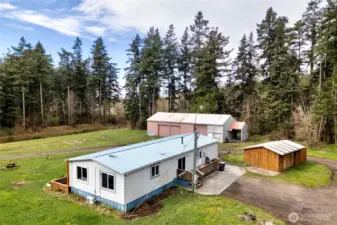 Exterior showcasing outbuildings and expansive property