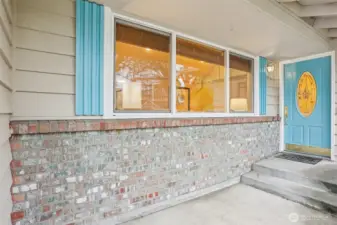 A bright and cheery entry leads you into a functional main living space.