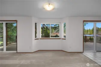 New carpet throughout. Bay windows and 2 sliding doors to go lakeside!