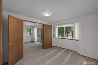 Bedroom 3 opens with french doors to primary room - could be used as an ensuite office?