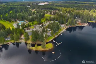 View of the Inn, island, swimming area, sports courts and pro shop.