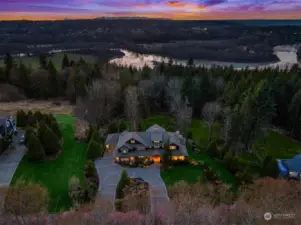 Near the Snohomish River, find this serene shy five acre estate with circular driveway and Mt. Baker views.