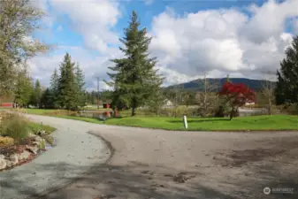 Marina driveway entrance to the left and home site to the right.