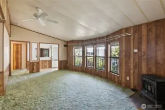 Another view of the living room looking back towards the front door entrance.