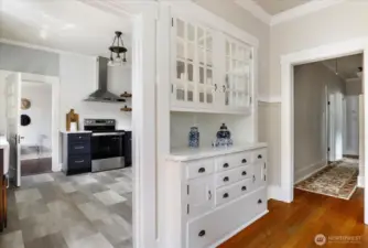 Original built-in cabinet, perfect pass through to kitchen